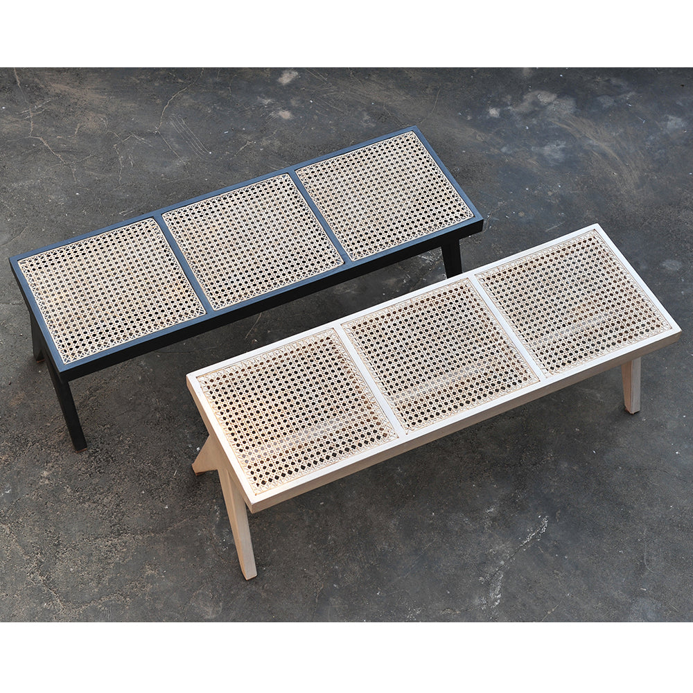 Timber and cane bench seats, one with with timber painted black and the other with timber whitewashed