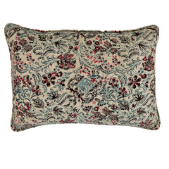 Photo of linen cushion showing up close pattern of blue and pink floral on beige linen
