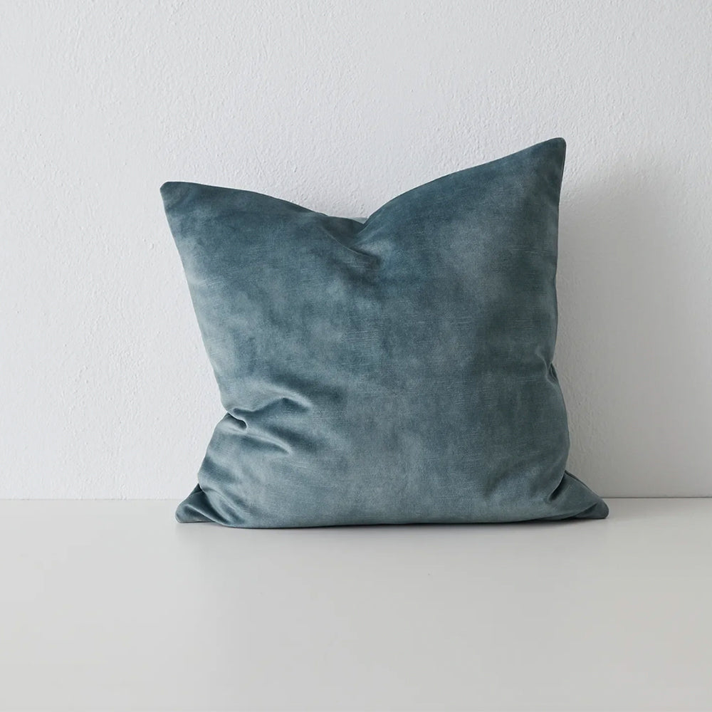 Photo of aqua blue velvet cushion