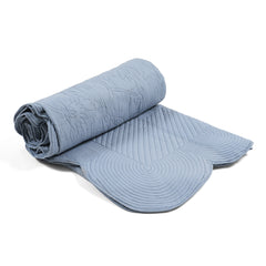 Photo of baby blue Ava cotton bedspread with scalloped edge, rolled up