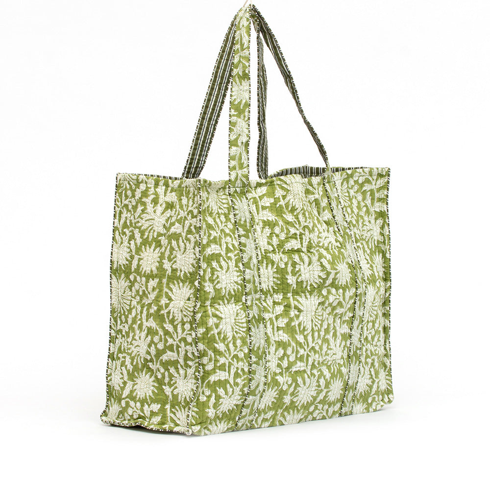 Photo of forest green floral block printed quilted tote bag.