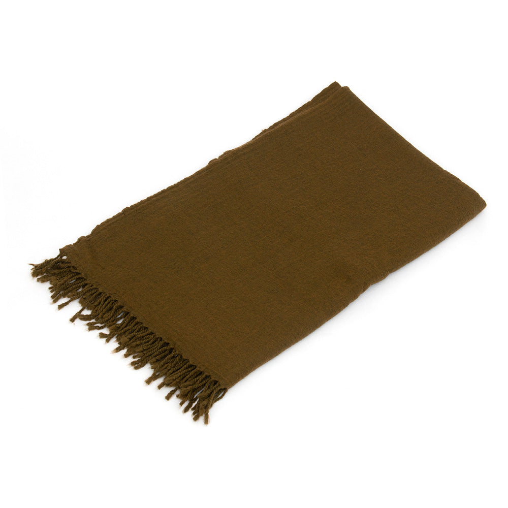 Photo of folded Olive Woollen Throw blanket and showing the fringe detail along the end of the throw.