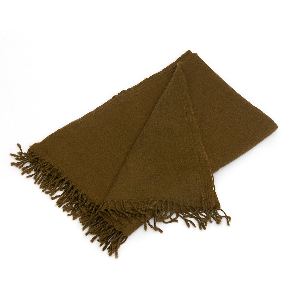 Photo of folded Olive Woollen Throw blanket and showing the fringe detail along the end of the throw.
