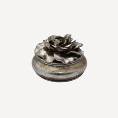 Resin trinket box with camelia pattern on top in silver pewter finish