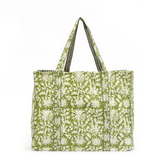 Photo of forest green floral block printed quilted tote bag.