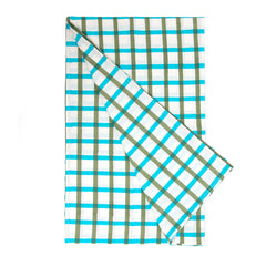 Photo of a folded white, aqua blue and olive green check fabric cotton tablecloth showing one corner turned upwards.