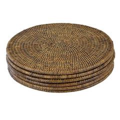 Photo of six dark brown rattan placemats piled on top of each other