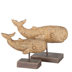 Photo of small and large Atlantis resin whales on timber stands