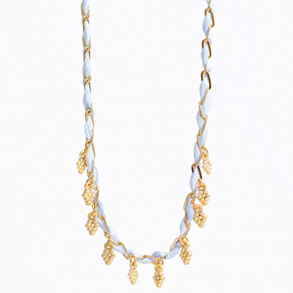Photo of gold plated and blue silk necklace interwoven with small gold grape charms
