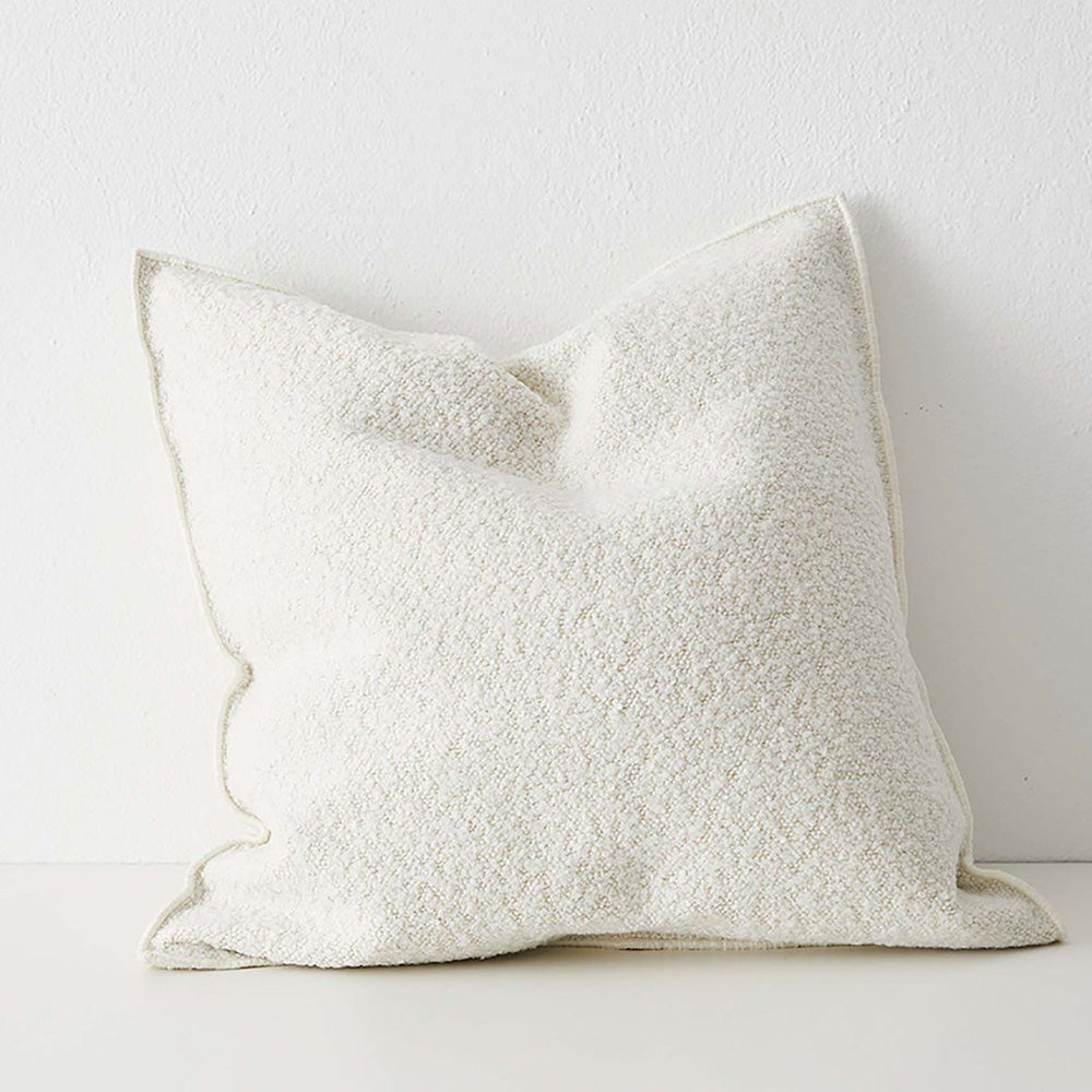 Photo of white boucle cushion