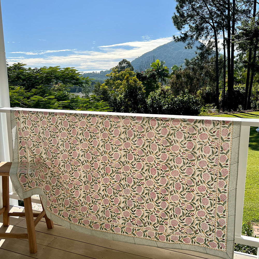 Photo of pink and green pomegranate Ava cotton tablecloth