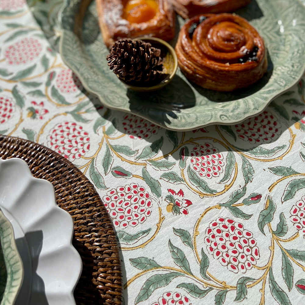 Photo of pink and green pomegranate Ava cotton tablecloth