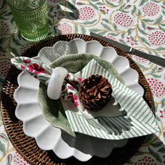 Photo of pink and green pomegranate Ava cotton napkins