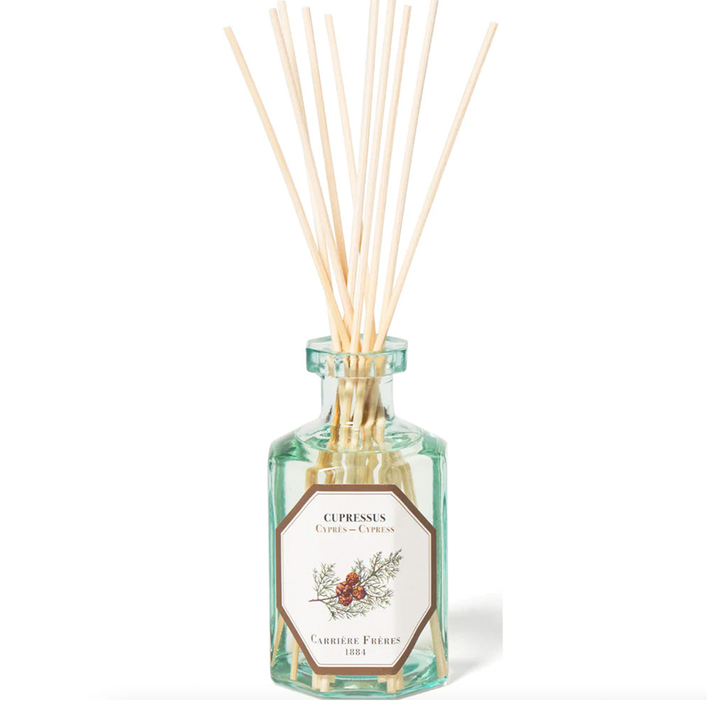 Photo of cypress scented room diffuser bottle and sticks made by Carriere Freres