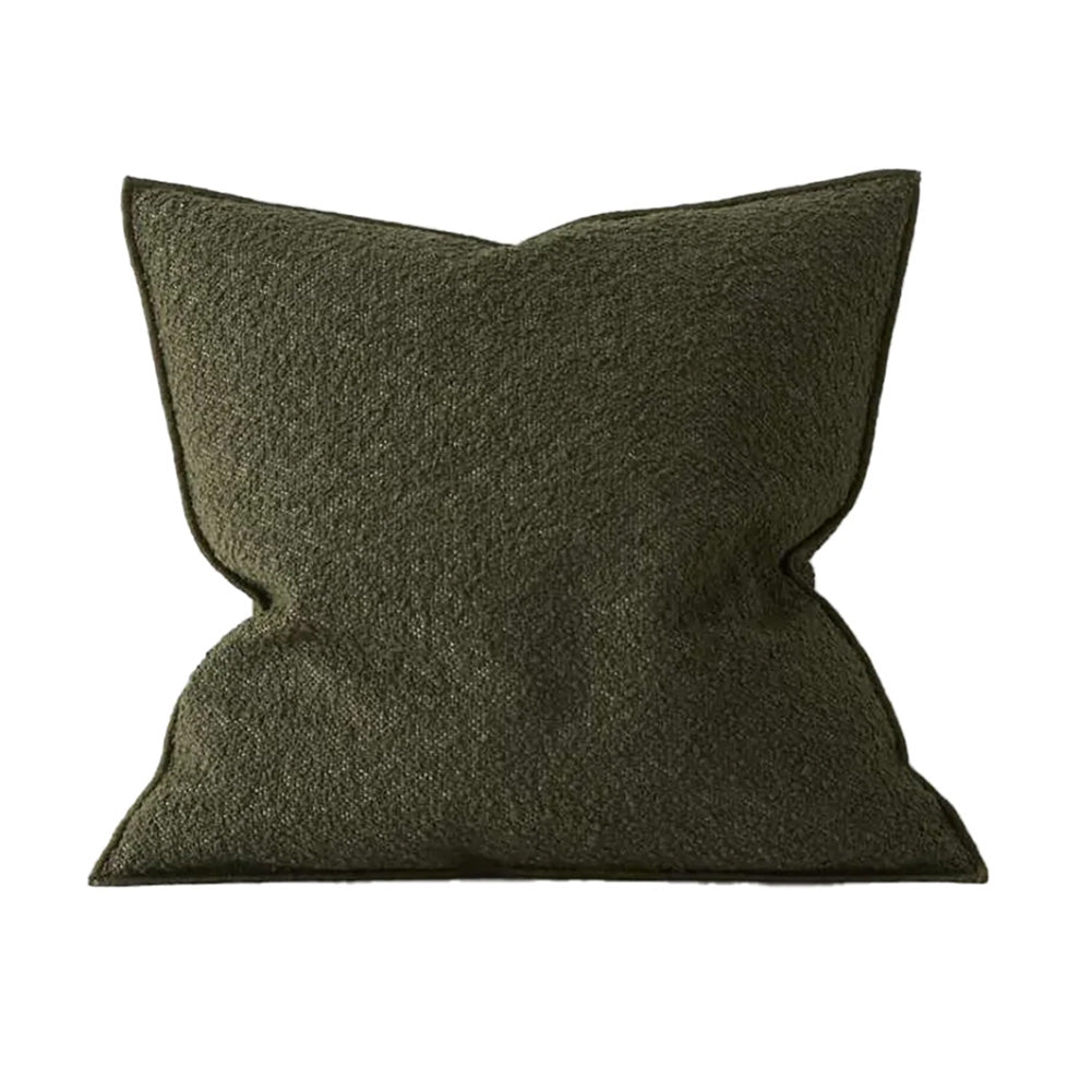 Photo of olive green boucle cushion